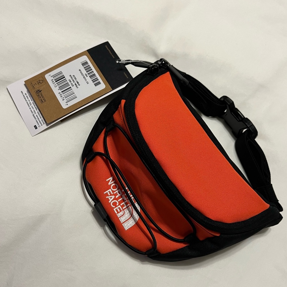 The North Face Jester Lumbar Pack in black & orange 📙